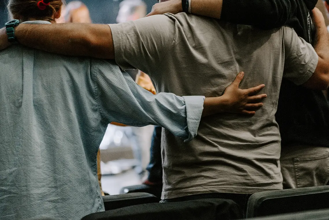 A Group of Christians pray to bless and pray for each other